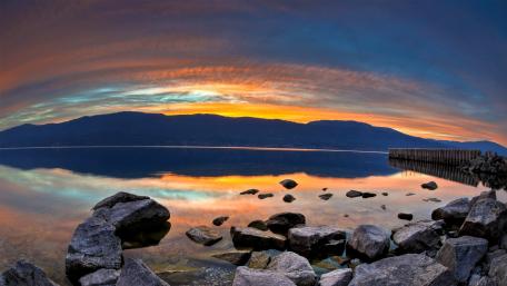 Serene Evening Reflections by the Shore wallpaper