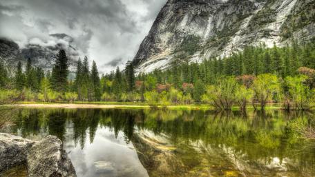 Serene Mountain Reflections in Nature's Embrace wallpaper