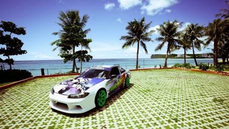 Vibrant Car by the Beach with Palm Trees wallpaper