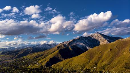 Majestic Mountain Landscape Under a Blue Sky wallpaper