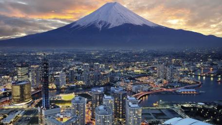 Majestic Cityscape with Mount Fuji Stunning Views at Dusk wallpaper