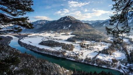 Winter Serenity Overlooking a Snowy Valley and River wallpaper