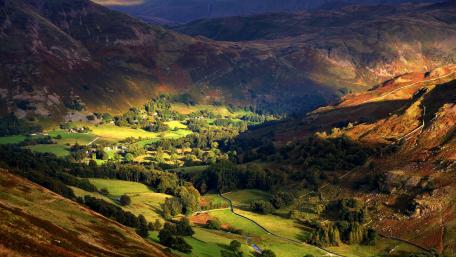 Serene Valley Under Vibrant Skies wallpaper