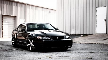 Sleek Black Sports Car Wallpaper wallpaper