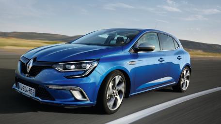 Sleek Blue Renault Zooming Down the Highway wallpaper