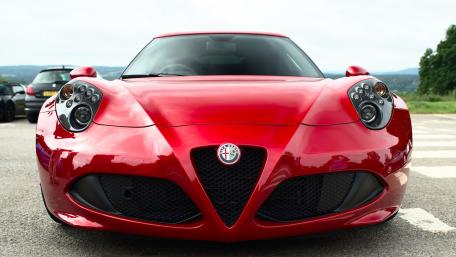 Sleek Red Sports Car Wallpaper wallpaper