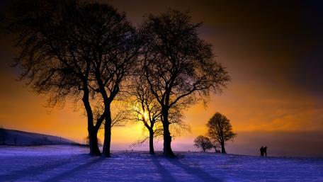 Winter Sunset Serenity Over Snowy Landscape wallpaper