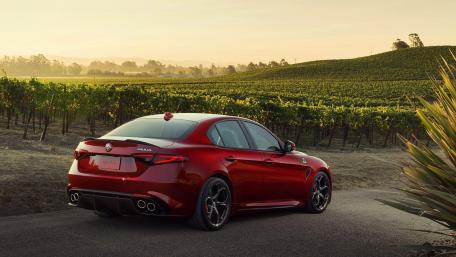 Sleek Luxury on Scenic Roads wallpaper
