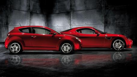 Sleek Red Cars in Dynamic Composition wallpaper