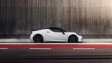 Sleek White Sports Car on Urban Street wallpaper