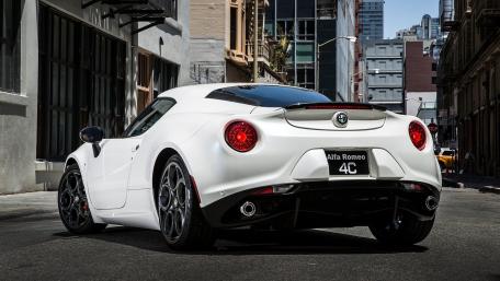 Sleek Alfa Romeo 4C in Urban Setting wallpaper
