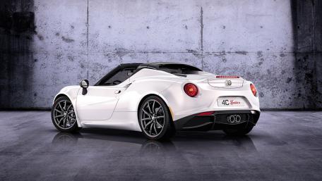 Sleek White Sports Car Against a Gritty Background wallpaper