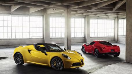 Sleek Italian Sports Cars in Urban Setting wallpaper