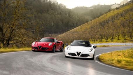 Sleek Alfa Romeo Spirited Drive in Nature Scene wallpaper