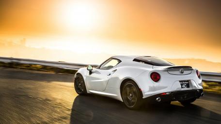 Stunning Sunset Drive with a Sleek Car wallpaper