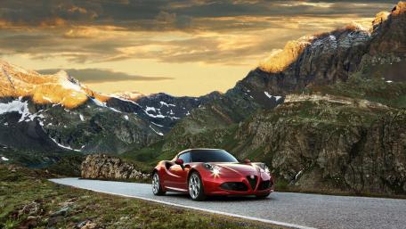 Majestic Car in a Scenic Mountain Landscape wallpaper