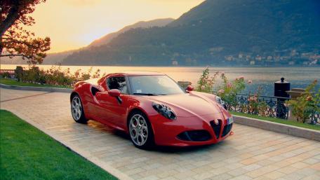 Stunning Alfa Romeo by the Sunset Shoreline wallpaper