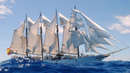 Majestic Sailing Ship on Vibrant Ocean Waves wallpaper