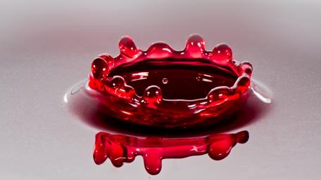 Radiant Red Splash Artistry wallpaper