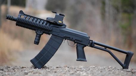 Sleek and Powerful Black Military Rifle Wallpaper wallpaper