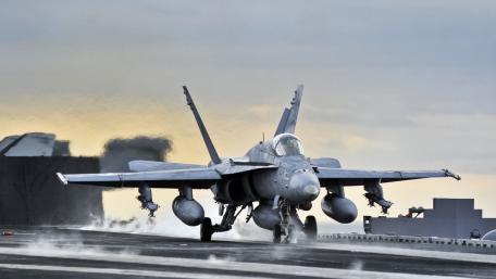 Fighter Jet Taking Off from Aircraft Carrier wallpaper