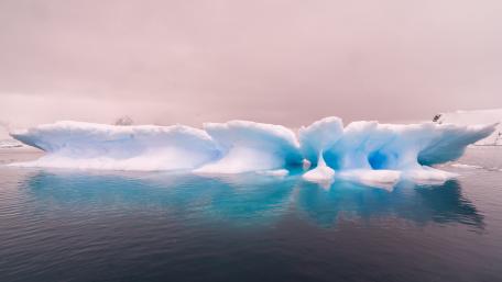 Iceberg Serenity in Tranquil Waters wallpaper