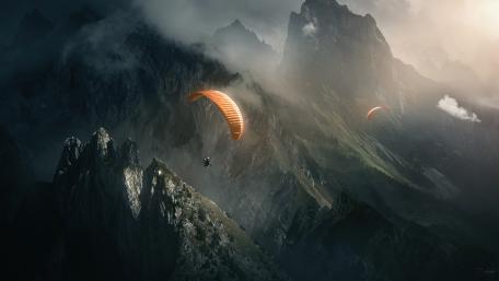Soaring High Above Majestic Mountains wallpaper