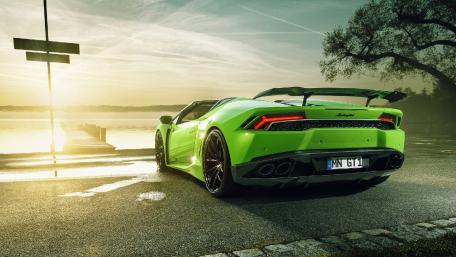 Lamborghini Huracán in Vibrant Green Sunset Scene wallpaper