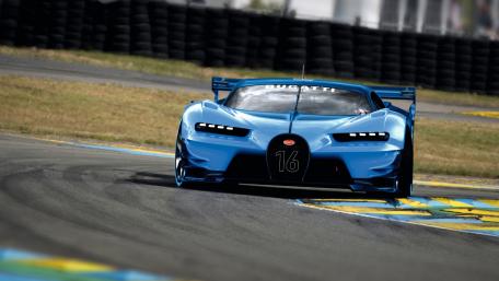 Blue Bugatti Racing Through Curves wallpaper