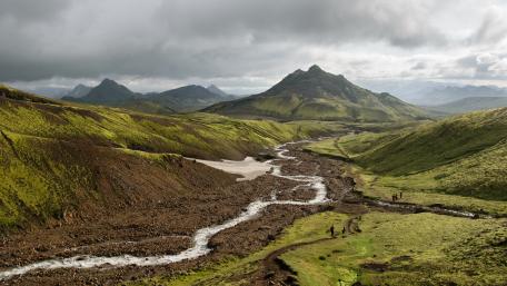 Majestic Green Hills and Serene River View wallpaper