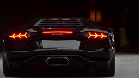 Sleek and Aggressive Lamborghini Aventador Rear View wallpaper