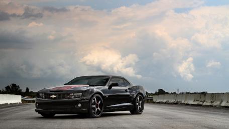 Bold Black Camaro Against Stunning Sky wallpaper