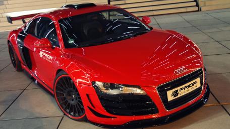 Sleek Red Audi R8 Ready for Action wallpaper