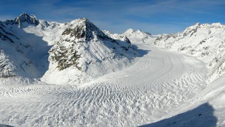 Majestic Glacial Landscape Under Clear Blue Sky wallpaper