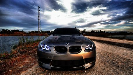 Sleek BMW M3 Against Dramatic Skies wallpaper