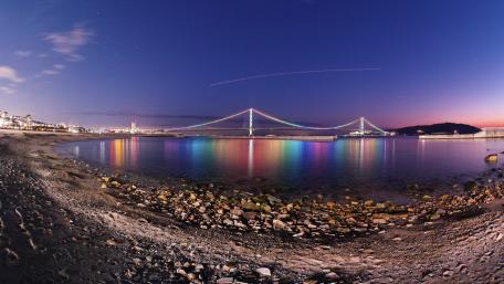 Serene Twilight Over the Bridge Reflection in Water wallpaper