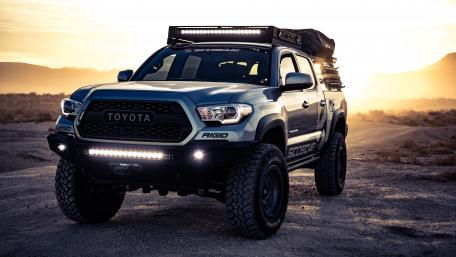 Rugged Toyota Tacoma at Sunset Adventure Scene wallpaper