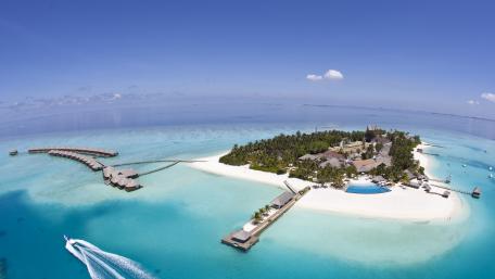 Tropical Paradise Aerial View of a Serene Island Resort wallpaper