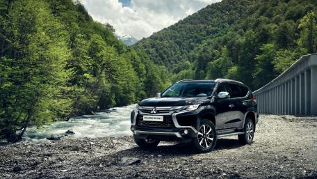 Sleek SUV Adventure in Nature wallpaper