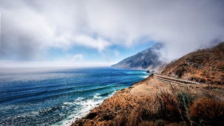 Coastal Serenity and Majestic Waves wallpaper