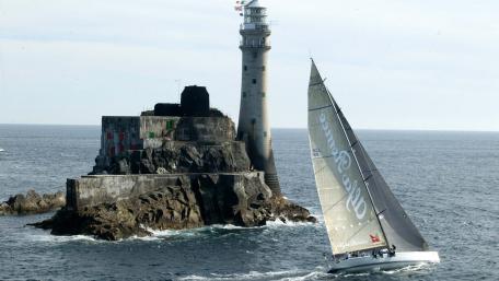 Serene Lighthouse Overlooking the Sea wallpaper