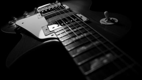Title: Strings of Melody in Shadowed Elegance wallpaper