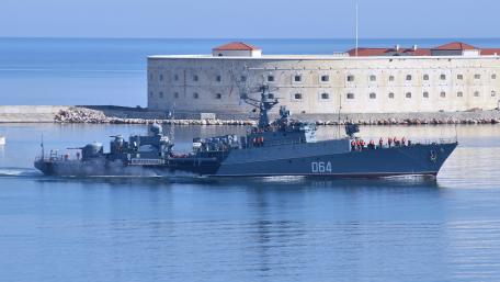Majestic Naval Presence on Calm Waters wallpaper