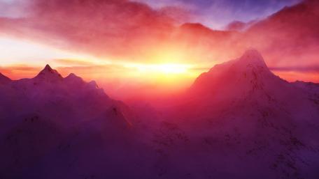 Majestic Sunset Over Snowy Peaks wallpaper