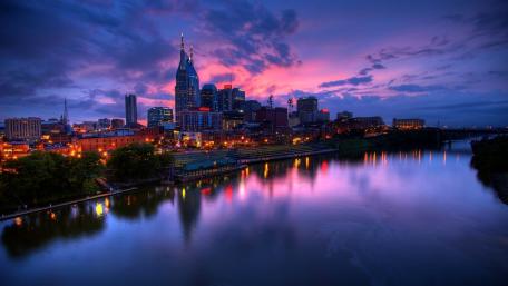 Vibrant Nashville Skyline at Dusk with Reflections wallpaper