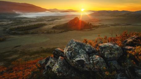 Serene Sunrise Over Majestic Landscape wallpaper