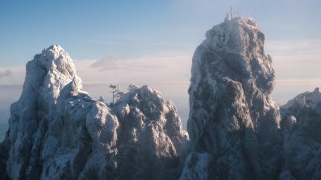 Majestic Snow-Covered Mountain Peaks in Tranquil Landscape wallpaper