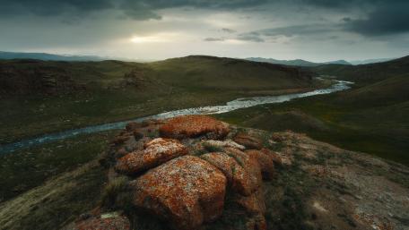 Stunning Serene Landscape of Rolling Hills and River wallpaper