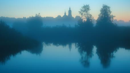 Misty Morning Serenity Over Waterway wallpaper