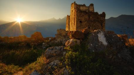 Ancient Ruins Bathed in Golden Light wallpaper
